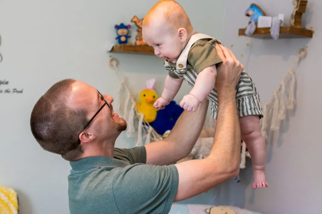 Baby and Dad Nursery Room Photo