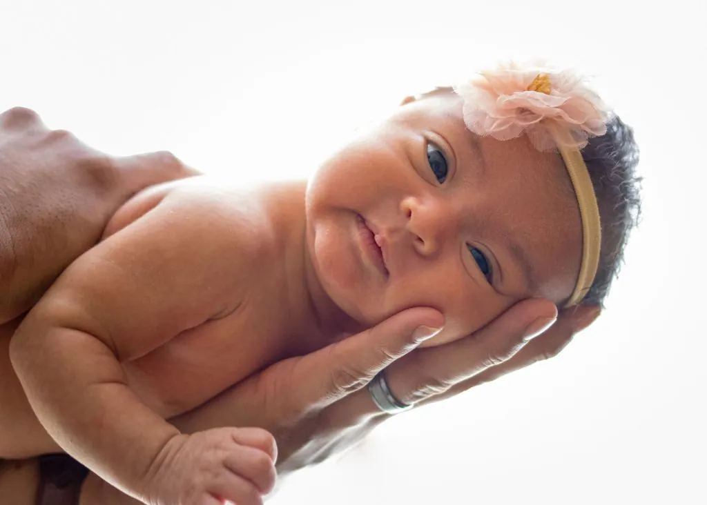 cute baby on a palm