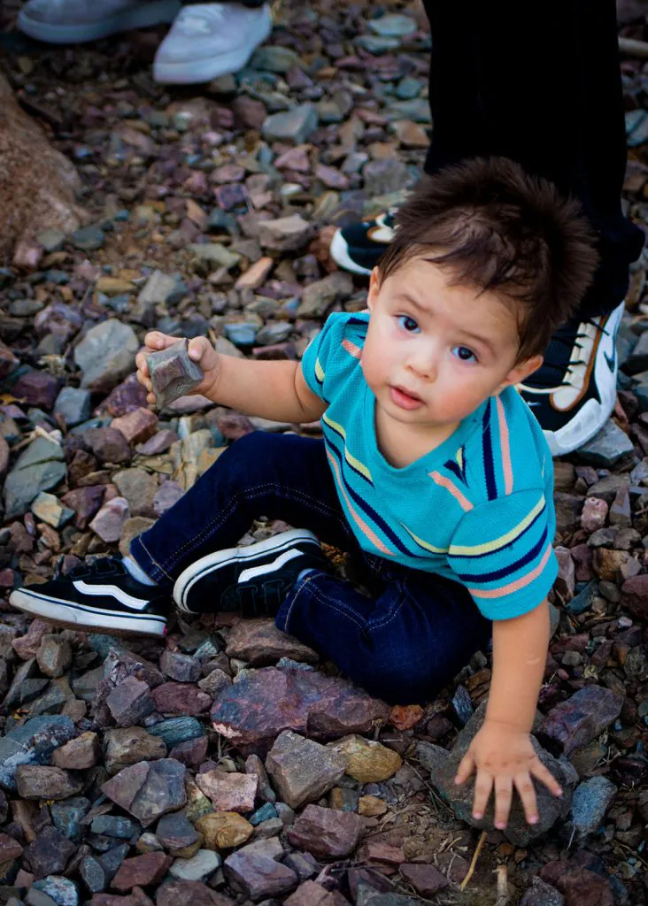 Little Kid Playing Stones Session