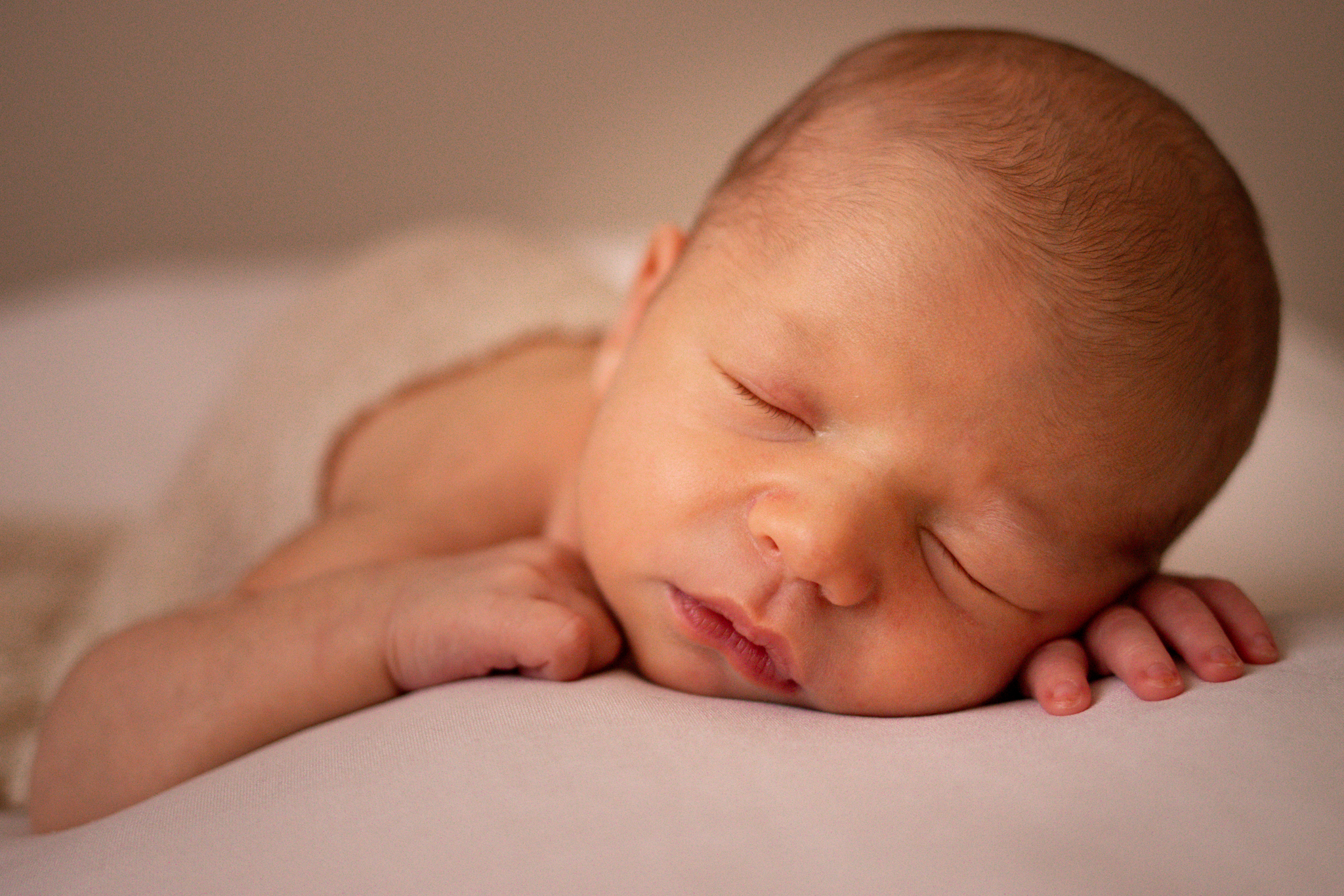 Sleeping Newborn Baby on Pillow