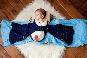 Sleeping Baby Wrapped with Blanket