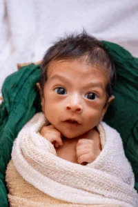 Newborn Baby Wrapped in a Blanket