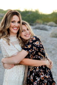 Daughter and Mother Hugging Each Other in Family Photo Session