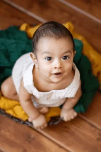 Photo of a baby sitting